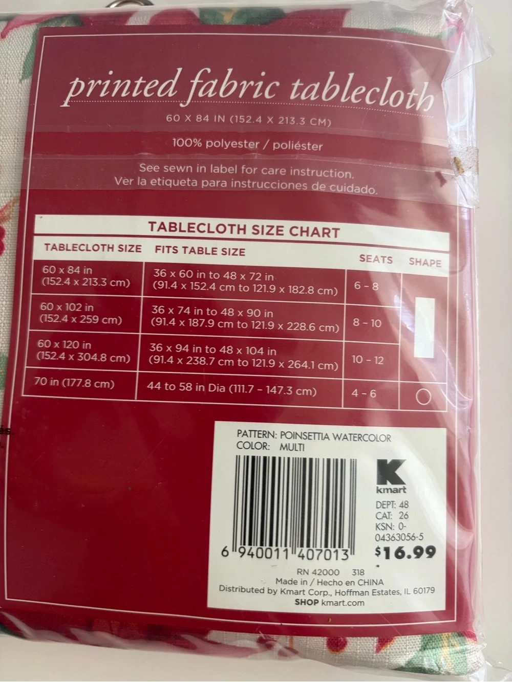 NWT Christmas print fabric tablecloth. 60x84 oblong. Original packaging